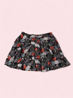Disney’s Her Universe Lion King Black Skater Skirt with Green Tropical Print